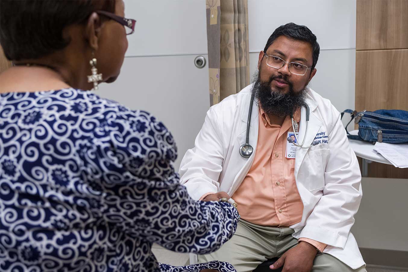 Dr. Haq with patient