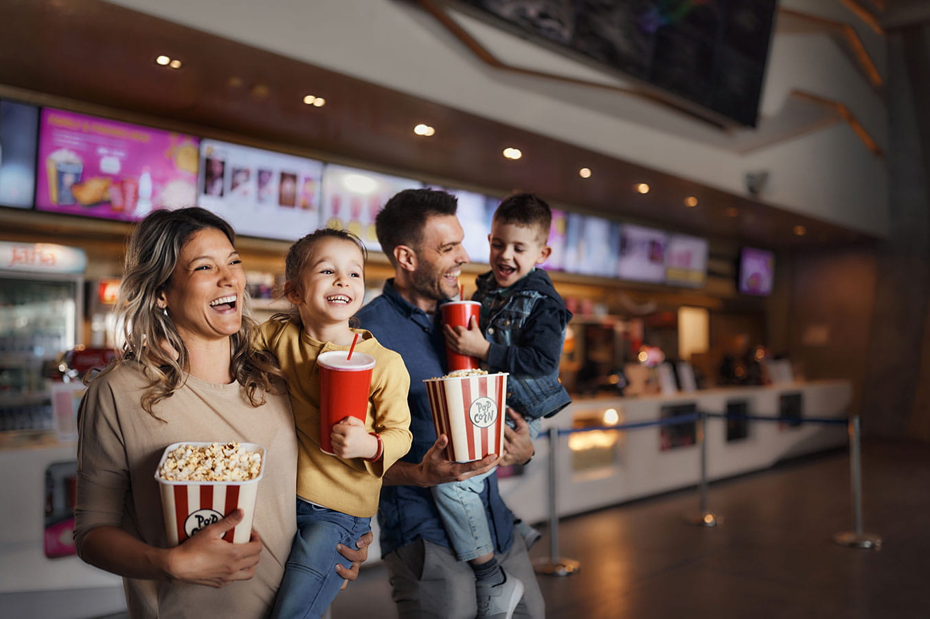Young family at the movie theater
