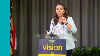 Sara M. Alger, president of University Health's Foundation team speaking at the Vision Luncheon