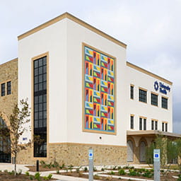 Exterior mural at University Health Vida