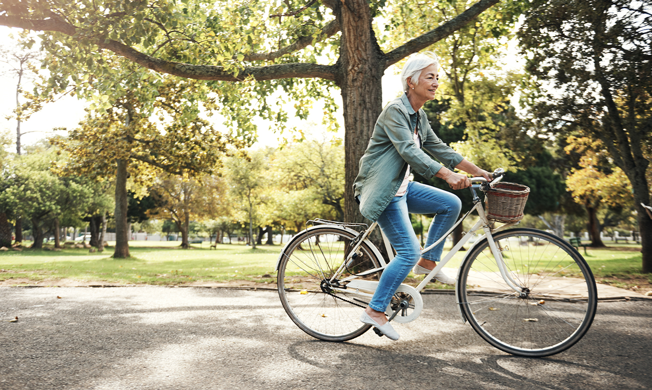 middle-aged woman enjoying bike riding