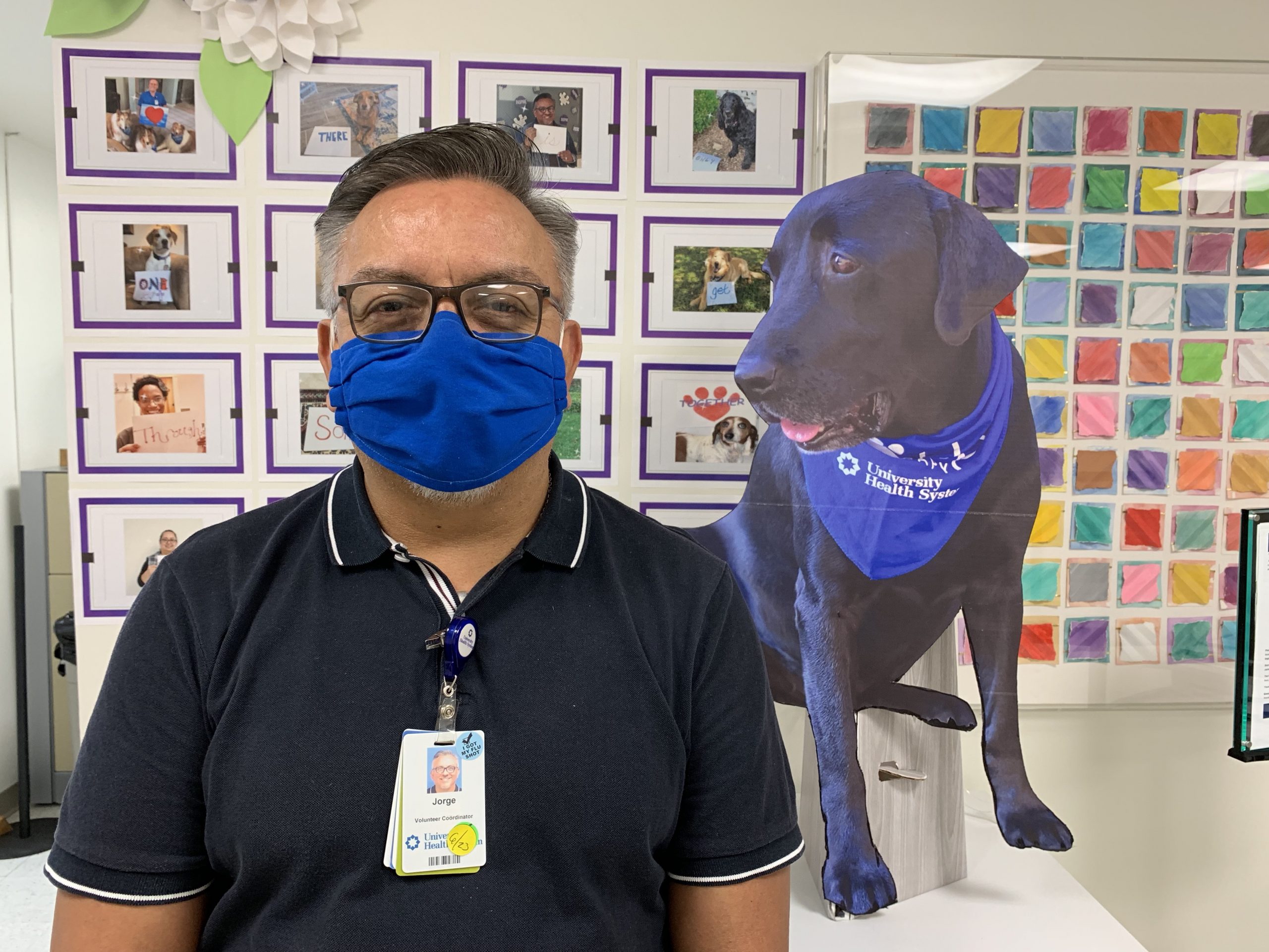 a male healthcare worker wearing a mask