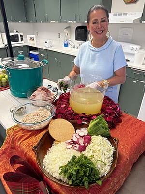 Blanca Aldaco, owner of Aldaco's Mexican Restaurant preparing the ingredients for Pozole Verde