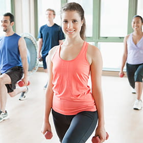 Group of men and women working out
