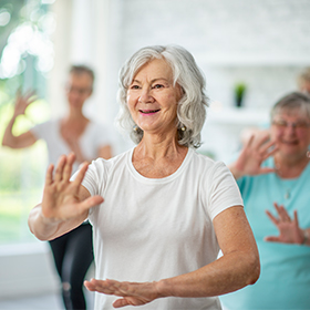 Woman doing Tai Chi.