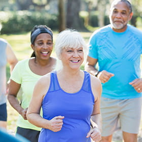 Group of elderly people walking.