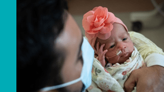 Picture of child with their parent