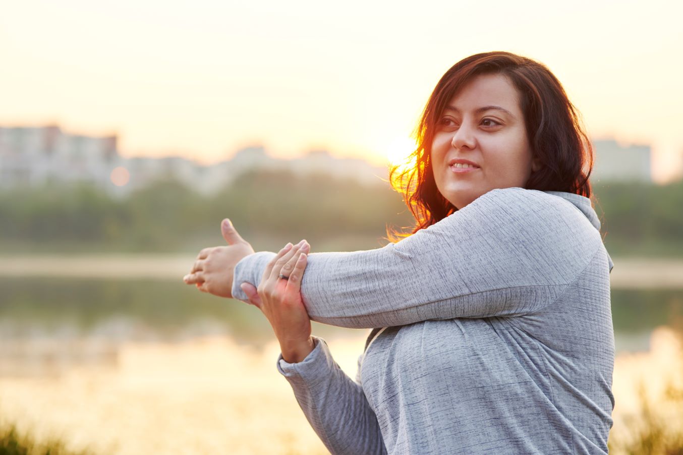 Woman stretching her arm
